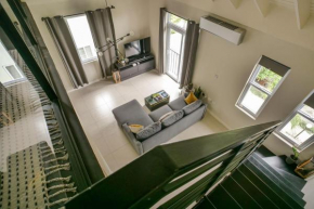 Choose To Be Happy at EI8HT! - Super Studios and Penthouse Apartment